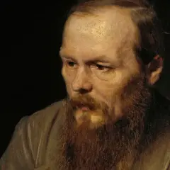 Portret mężczyzny z burą brodą, którego spojrzenie zdaje się odzwierciedlać objawy szaleństwa u protagonistów w powieściach psychologicznych Dostojevskiego.