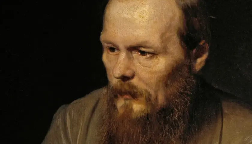 Portret mężczyzny z burą brodą, którego spojrzenie zdaje się odzwierciedlać objawy szaleństwa u protagonistów w powieściach psychologicznych Dostojevskiego.
